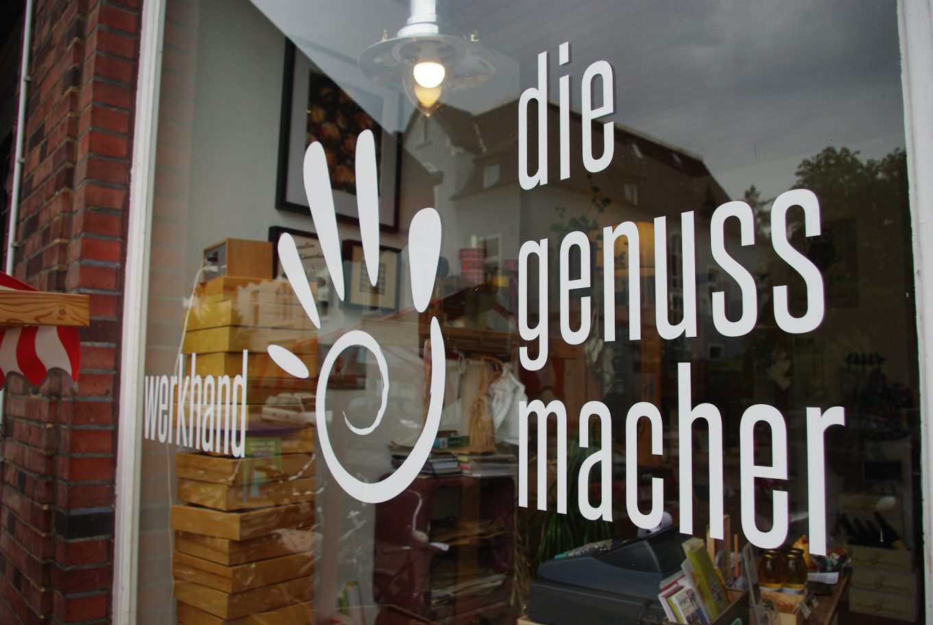 Schaufenster mit Aufschrift die Genussmacher